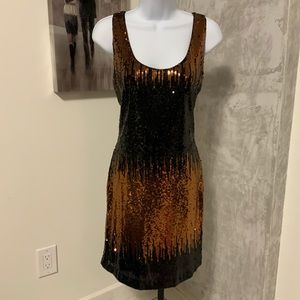 Sequin dress black/bronze.
